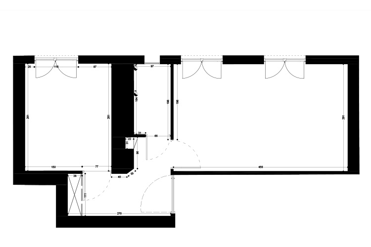Plan d'architecte en 2D avec un sas d'entrée, une sur la gauche et un grand séjour sur la droite.