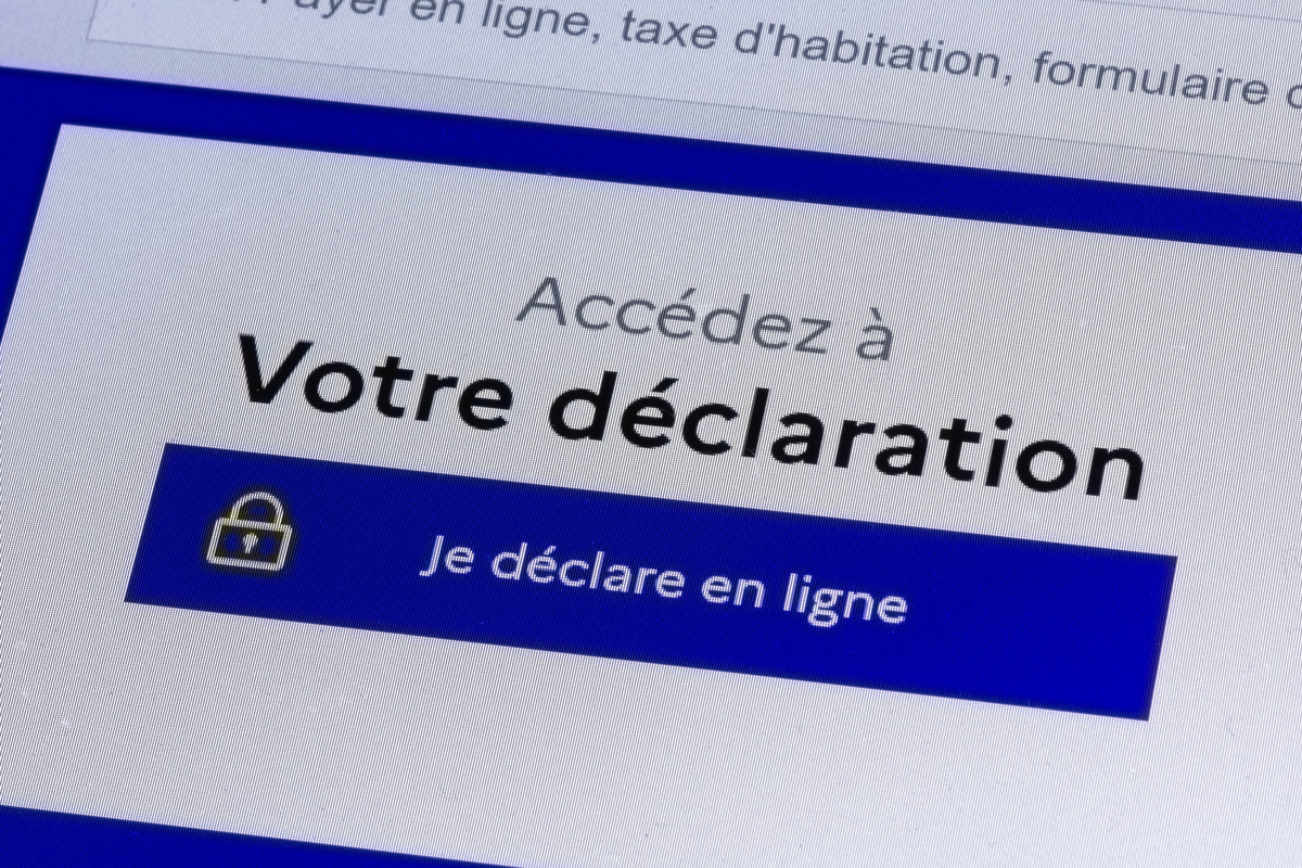 Gros plan sur un détail du site des impôts : le bouton pour accéder à la déclaration en ligne de ses revenus locatifs